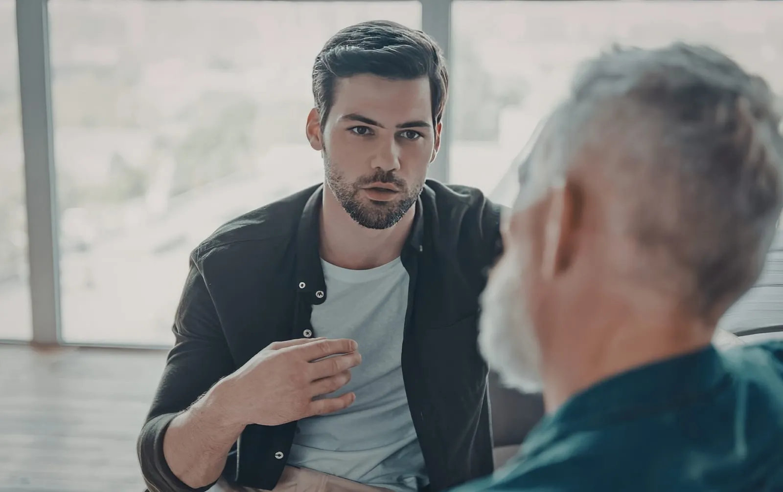 A focused one-on-one conversation in a private PIVOT intensive